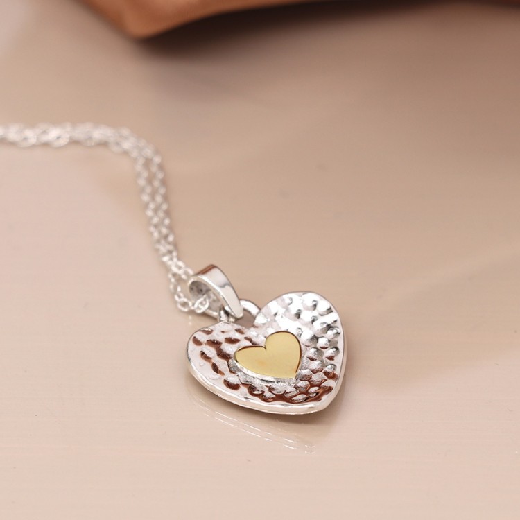 Sterling silver and brass hammered heart necklace