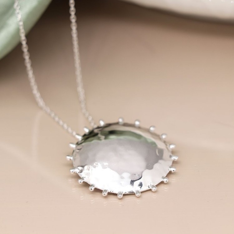 Sterling silver hammered sun disc necklace