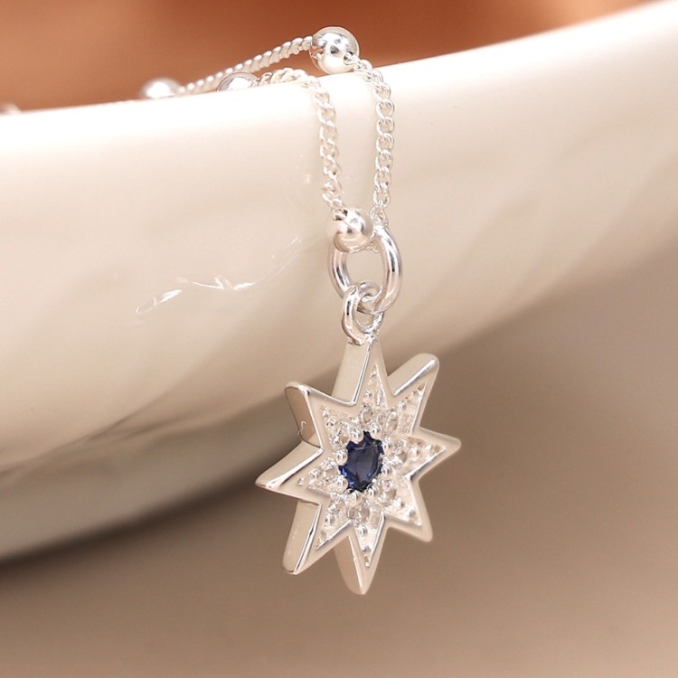 Sterling silver star and navy stone necklace